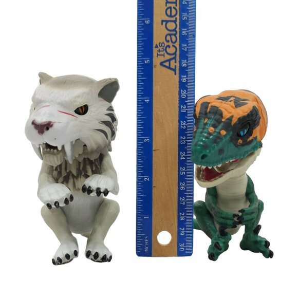 WowWee Fingerling Untamed Raptor Fury Velociraptor Silvertooth Sabre Tooth Tiger - Picture 12 of 12